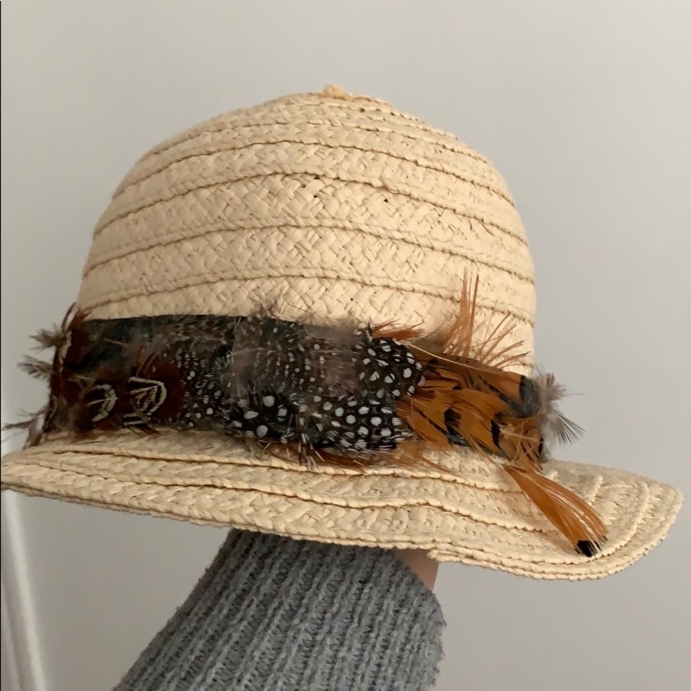 Hat with feather detailing